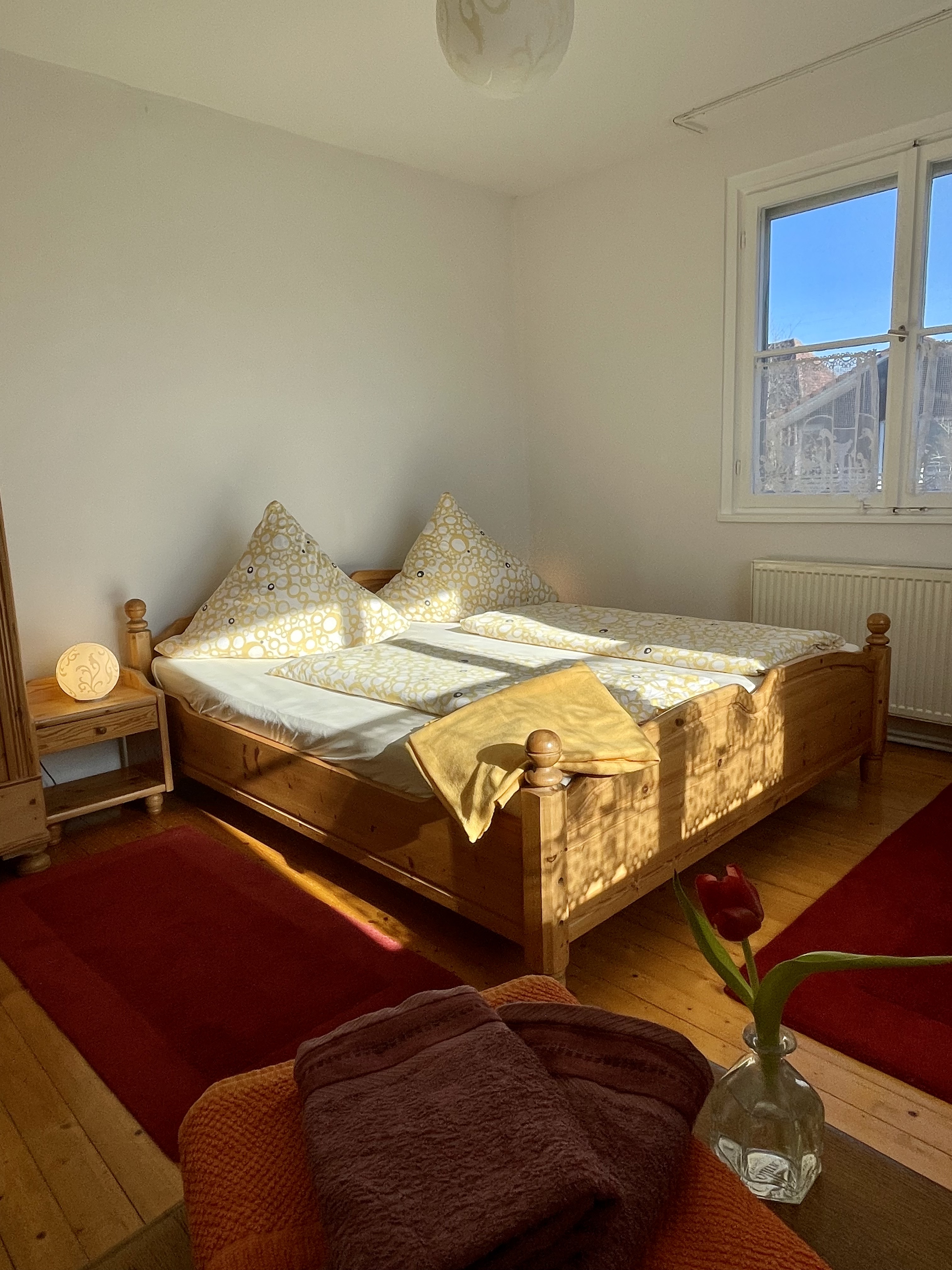 Master bedroom at Villa Salem with double bed and warm evening light